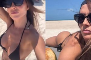 Deborah Secco de biquini fio-dental preto em praia do CE